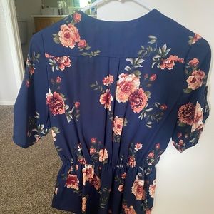 Floral blouse with 1/4 zip neckline
